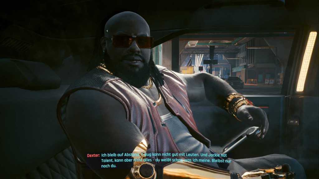 Screenshot aus Cyberpunk 2077 von der Nintendo Switch 2. Der Spielercharakter spricht im Auto mit dem NPC Dexter.