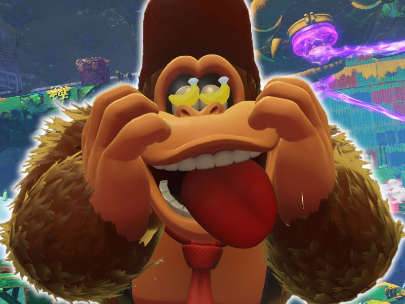Screenshot aus Donkey Kong Bananza. Im Vordergrund ist DK selbst zu sehen, wie er sich über Bananen freut.