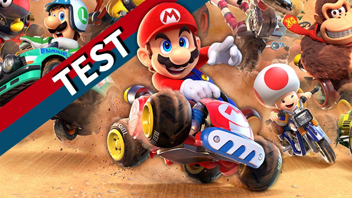 Eine Collage aus Mario Kart World und einem rot-blauen Banner mit dem weißen Wort Test darauf.